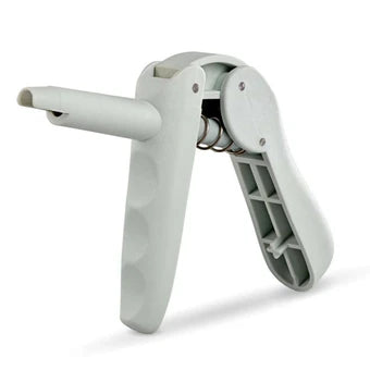 Composite dispensing gun with a metal tip