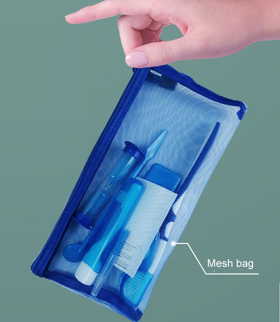 8-piece orthodontic patient kit in blue mesh bag including dental floss, wax, threaders, toothbrushes, dental mirror, timer, and interdental brush