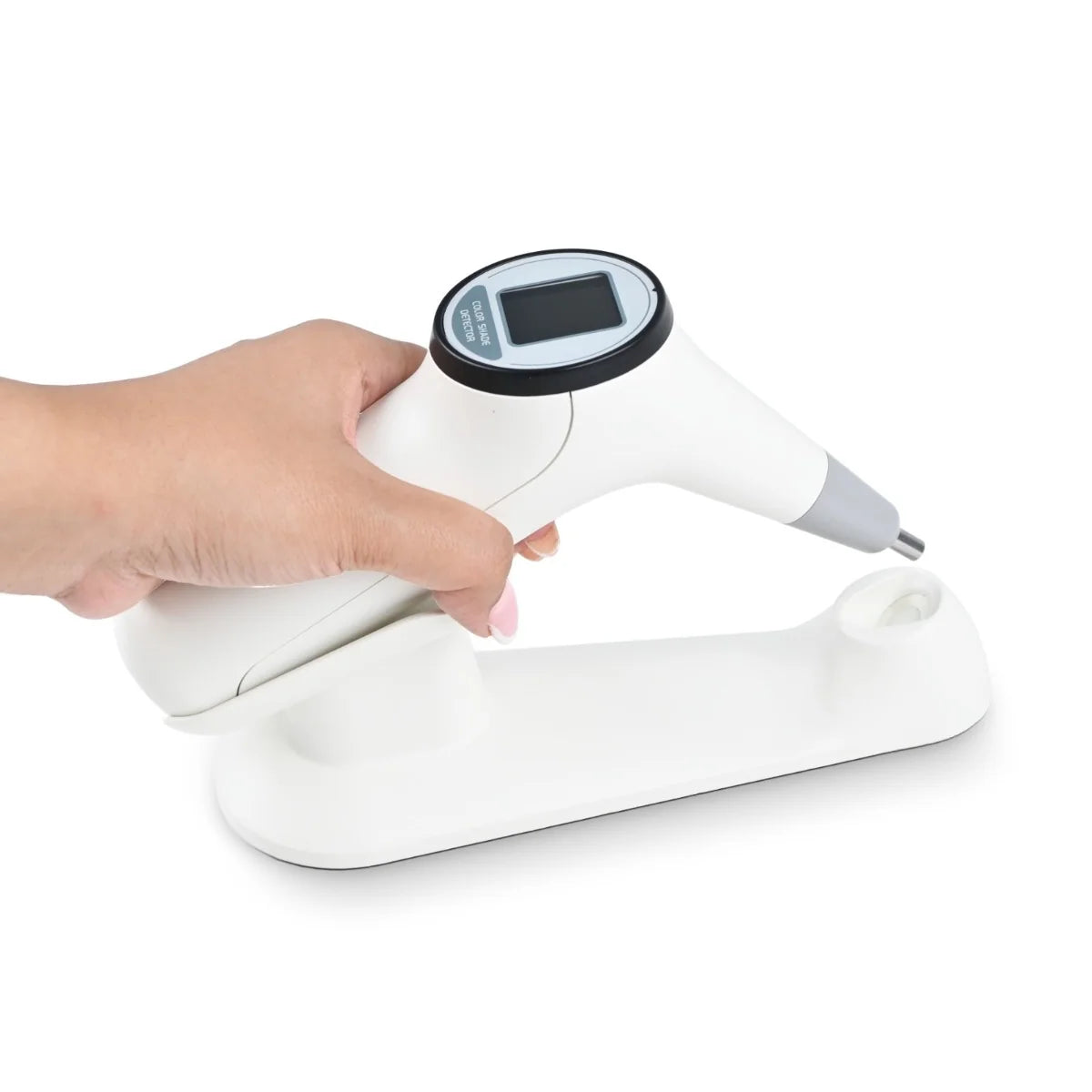 Digital dental tooth shade comparator with colorimeter, base, data cable and charger.