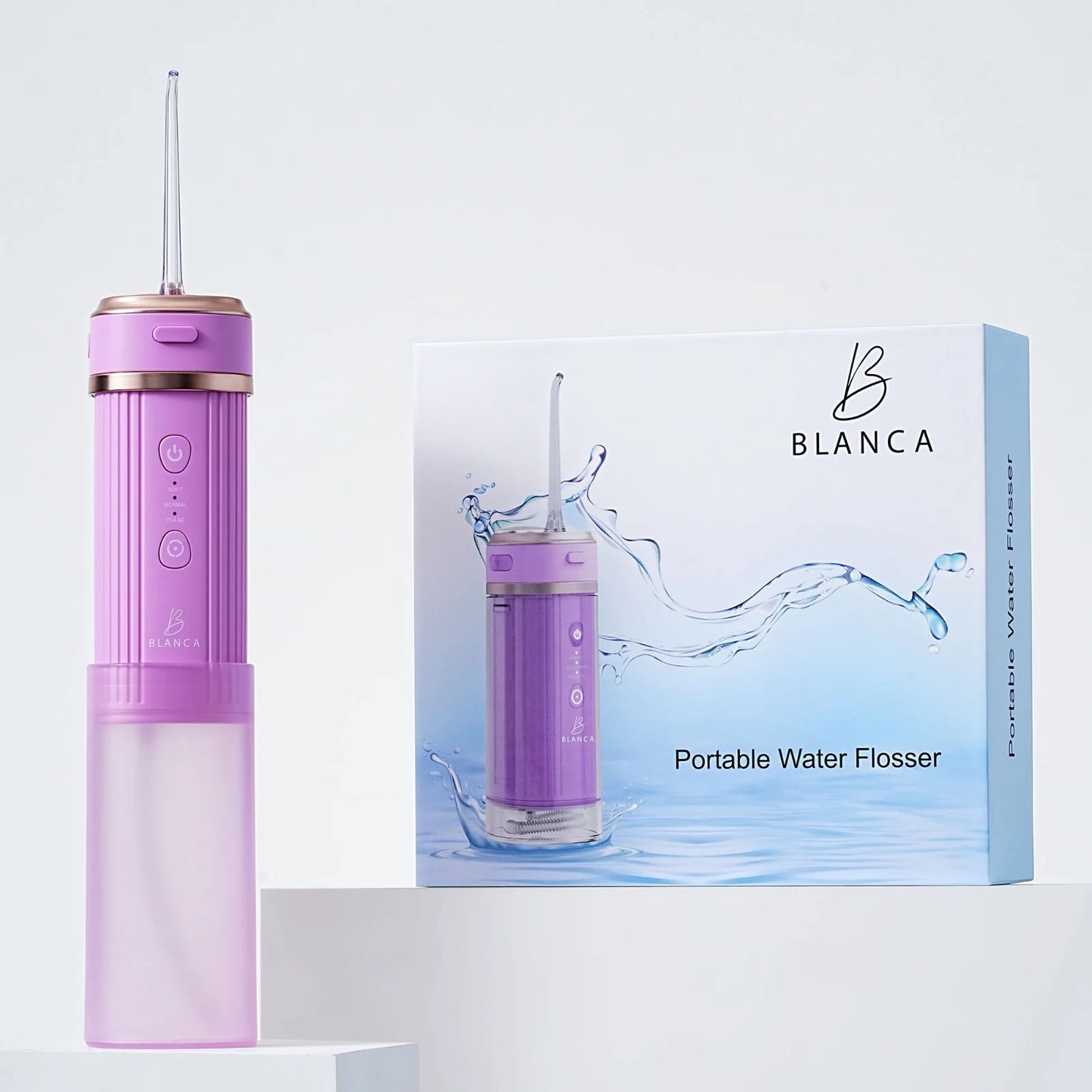 Pink portable water flosser Blanca electric toothbrush professional oral care dental clinic Canada
