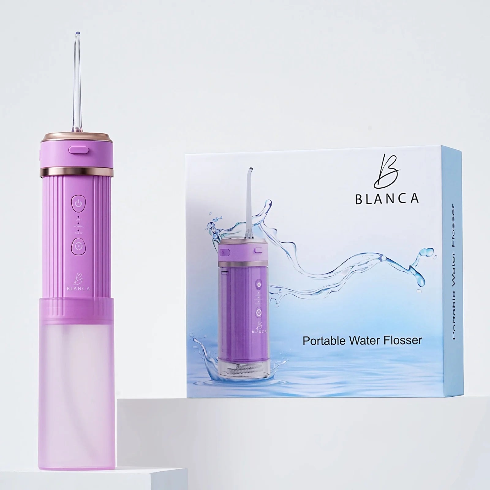Pink portable water flosser Blanca electric toothbrush professional oral care dental clinic Canada