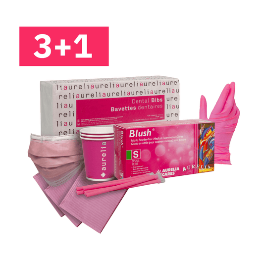A dental hygiene starter kit featuring pink and white items including a box of Aurelia Care Blush mouthwash, pink disposable cups, pink face masks, pink gloves, and pink tooth picks
