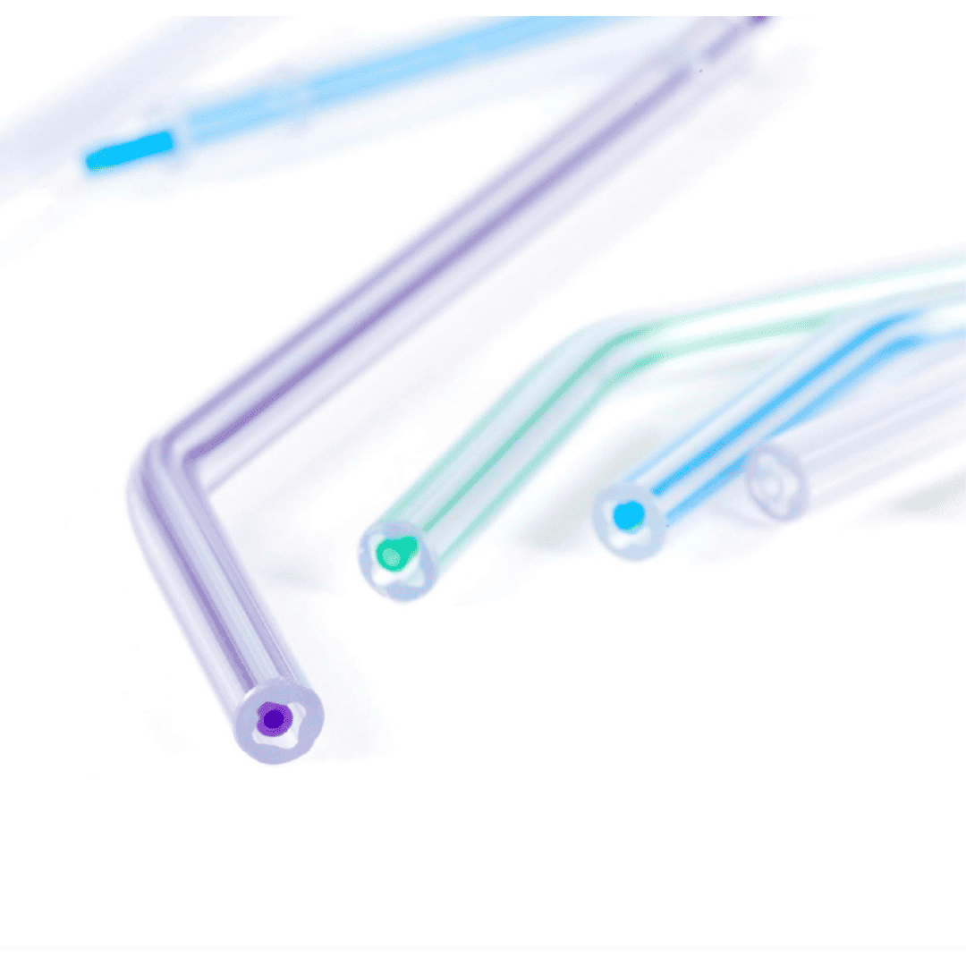 Close-up of disposable dental air water syringe tips in assorted colors