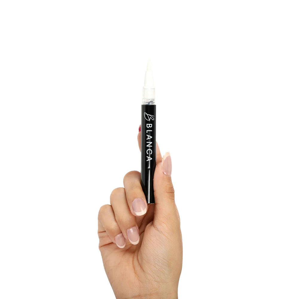Hand holding a black pen with 'Blanca' branding Blanca gel whitening pen touch-up whitening dental patient retail Canada